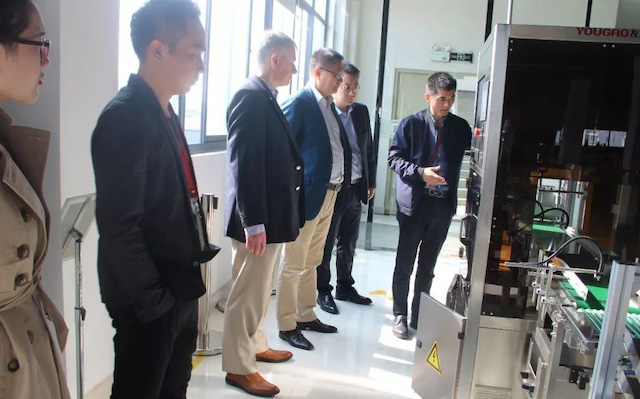 多米诺喷码机高层会见友高，，，，，，，，共商标识2.0